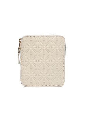 COMME des GARCONS Star Embossed Zip Fold Wallet in Off White - White. Size all.