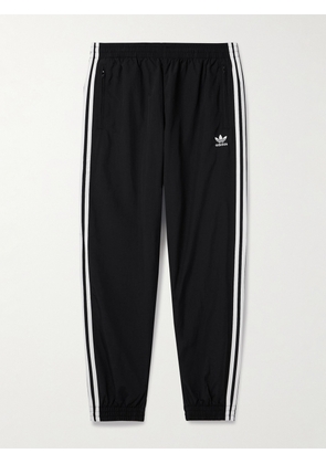adidas Originals - Logo-Embroidered Striped Shell Sweatpants - Men - Black - XS