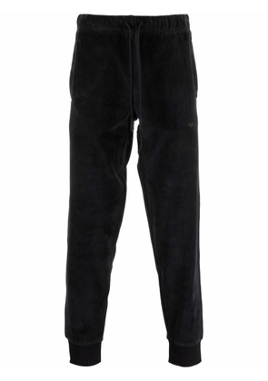 Carhartt WIP logo-embroidered velvet track pants - Black