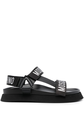 Moschino logo-strap flat sandals - Black