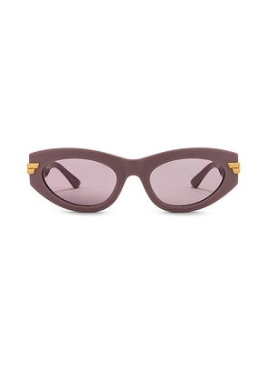 Bottega Veneta Bold Ribbon Cat Eye Sunglasses in Pink.