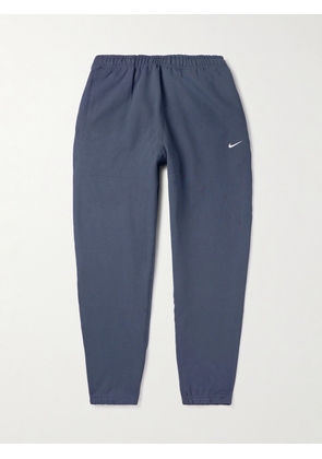 Nike - Solo Swoosh Tapered Logo-Embroidered Cotton-Blend Jersey Sweatpants - Men - Blue - XS
