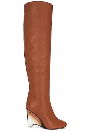 ALAÏA Wedge Boots 100 in Cognac - Rust. Size 41 (also in 36, 37, 39, 40).