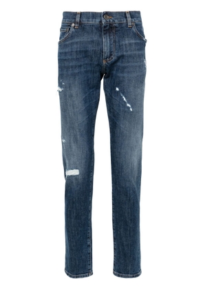Dolce & Gabbana ripped-detail tapered jeans - Blue