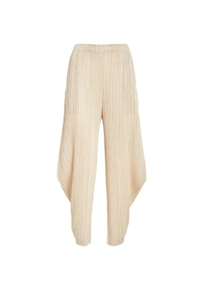 Pleats Please Issey Miyake Pleated Tapered Trousers