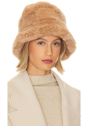 Apparis Gilly Butterscotch Checkerboard Shearling Hat in Tan.