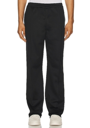 Malbon Golf Sierra Tricot Pant in Black. Size L, M, XL/1X.