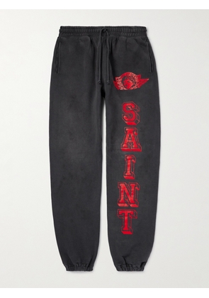 SAINT Mxxxxxx - Angel of Death Tapered Logo-Print Cotton-Jersey Sweatpants - Men - Black - S