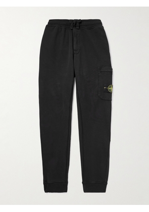 Stone Island - Tapered Logo-Appliquéd Cotton-Jersey Sweatpants - Men - Black - S