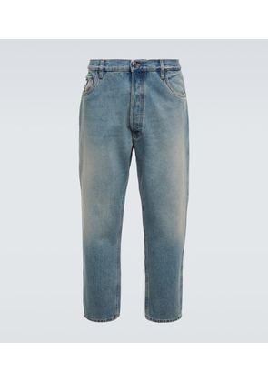 Prada Distressed mid-rise tapered jeans