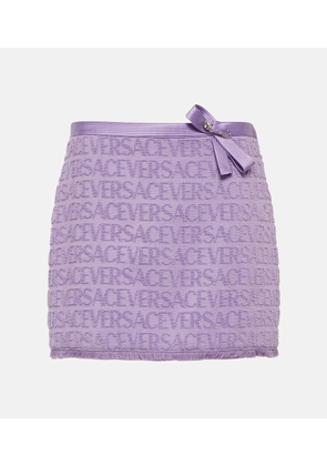 Versace Embellished logo cotton miniskirt