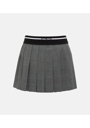 Miu Miu Pleated virgin wool mini skirt