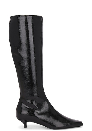 Toteme Slim Knee High Boot in Black - Black. Size 36 (also in 38, 39, 40).