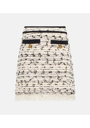Giambattista Valli Fringed tweed miniskirt