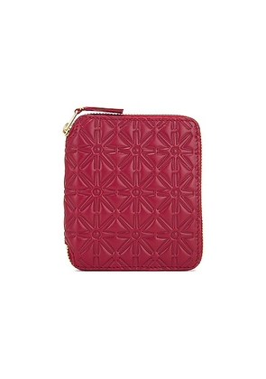 COMME des GARCONS Embossed Leather Zip Wallet in Red - Red. Size all.