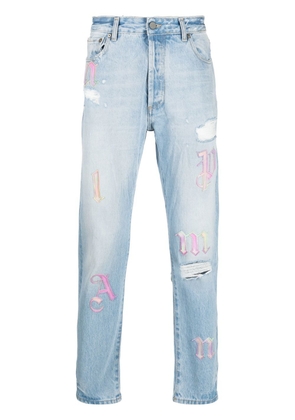 Palm Angels ripped embroidered tapered jeans - Blue