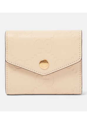 Gucci Medium GG debossed leather wallet