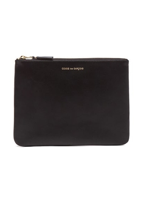 COMME des GARCONS Classic Pouch in Black - Black. Size all.