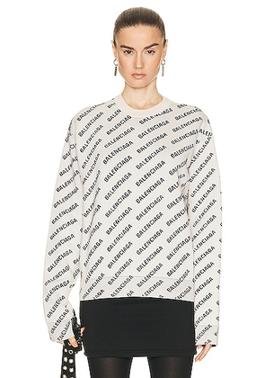 Balenciaga All Over Logo Knit Sweater in Chalky White & Black - White. Size S (also in ).