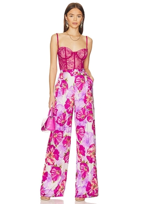 Katie May Tink Jumpsuit in Fuchsia. Size M, XS, XXS.