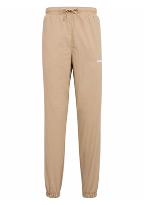 STADIUM GOODS® logo-embroidered ''Taupe'' track pants - Neutrals
