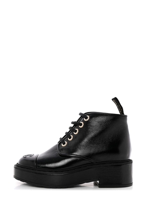 CHANEL Pre-Owned CC stitch combat boots - Black