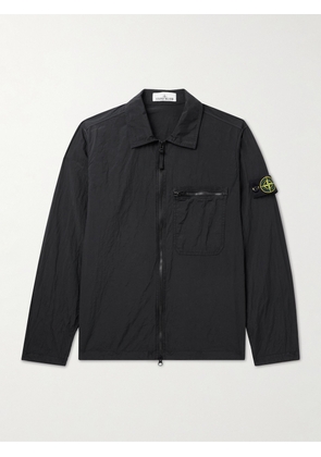 Stone Island - Logo-Appliquéd Garment-Dyed Crinkle Reps ECONYL® Nylon Overshirt - Men - Black - S