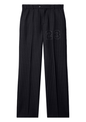 Off-White number-print pinstriped slim-cut trousers - Black