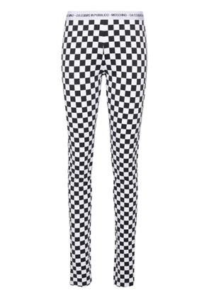 Moschino checkerboard-print flared trousers - White