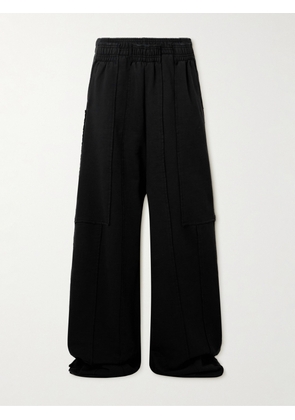 VETEMENTS - Wide-Leg Panelled Cotton-Blend Jersey Sweatpants - Men - Black - XS