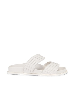 ALAÏA Leather Slides in Blanc Casse - White. Size 36 (also in 37, 37.5).