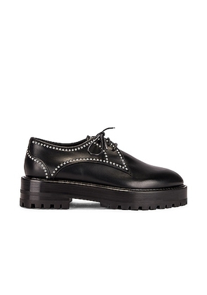 ALAÏA Eyelet Derby Loafers in Noir - Black. Size 35 (also in 35.5, 41).