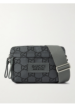 Gucci - Leather-Trimmed Logo-Appliquéd Monogrammed Ripstop Messenger Bag - Men - Gray