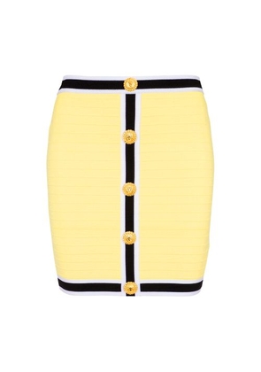 Short buttoned knit skirt