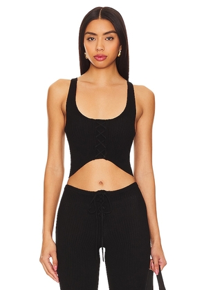 Camila Coelho Artemis Lace Up Knit Top in Black. Size M, S, XS.