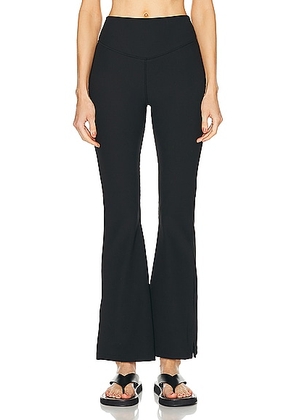 THE UPSIDE Ribbed Florence Flare Pant in Black - Black. Size L (also in M, XS).