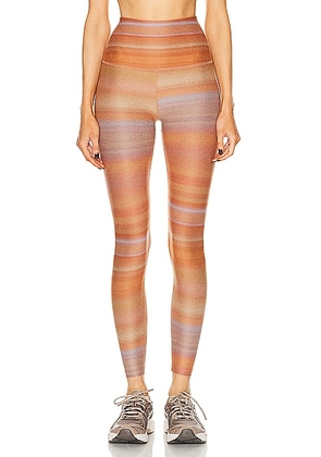 Beyond Yoga Soft Mark High Waisted Midi Legging in Ombre Stripe - Burnt Orange. Size L (also in S, XS).