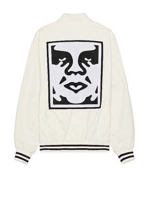 Obey Icon Face Varsity Jacket in Cream. Size M, S, XL/1X.