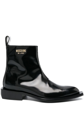 Moschino Camperos logo-plaque patent-leather boots - Black