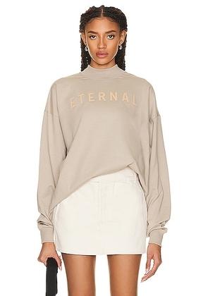 Fear of God Eternal T Shirt in dusty beige - Taupe. Size L (also in M, XL/1X, XXL/2X).