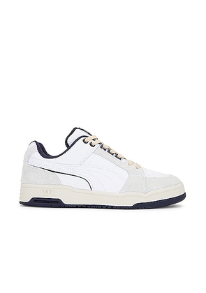 Puma Select Slipstream Low Baseline Sneaker in White - White. Size 10.5 (also in 11.5, 12, 13, 8, 8.5, 9.5).