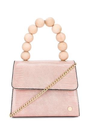 olga berg Caylee Wooden Bead Top Handle Bag in Pink.