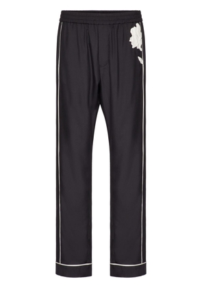 Valentino Garavani flower-appliqué silk pajama trousers - Black