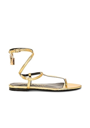 TOM FORD Padlock Thong Sandal in Gold - Metallic Gold. Size 36 (also in 36.5).
