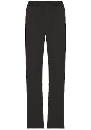 The Row Jonah Pants in Black - Black. Size L (also in S).