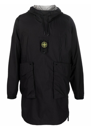 Stone Island logo-patch drawstring-hood raincoat - Black