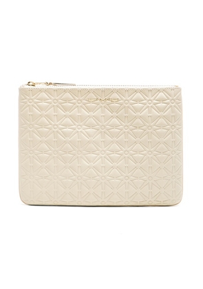 COMME des GARCONS Star Embossed Pouch in Off White - White. Size all.