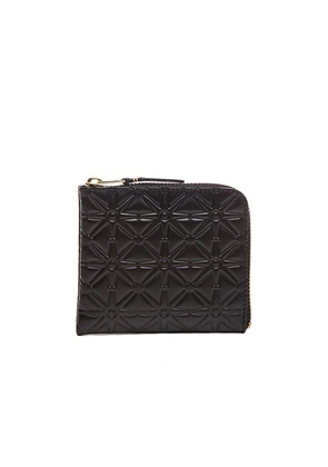 COMME des GARCONS Small Star Embossed Zip Wallet in Black - Black. Size all.