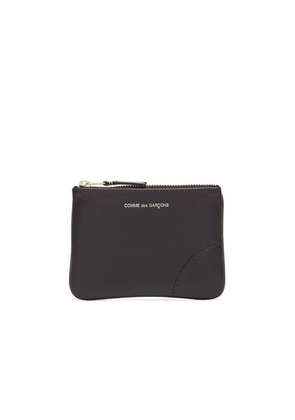 COMME des GARCONS Classic Small Pouch in Black - Black. Size all.