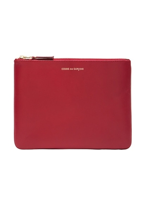 COMME des GARCONS Classic Pouch in Red - Red. Size all.
